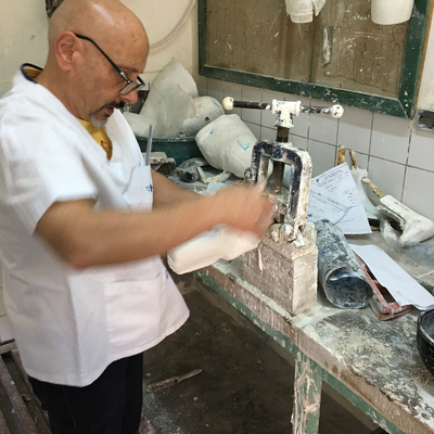 Roberto Postelmans processing a plaster cast.  HVP-Gatagara | Gatagara, Rwanda.  