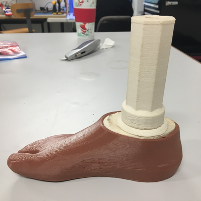 3D printed prosthetic foot designed by Roberto Postelmans, connected with 3D printed hardware to a 3D printed pylon designed by Kyle Reeser.  HVP-Gatagara | Musoma, Tanzania.  
