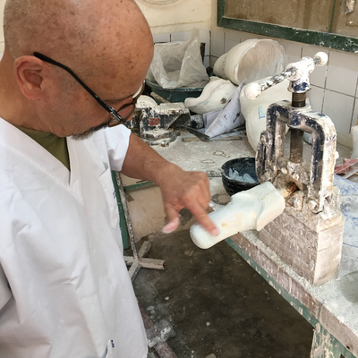 Roberto Postelmans processing a plaster cast.  HVP-Gatagara | Gatagara, Rwanda.  