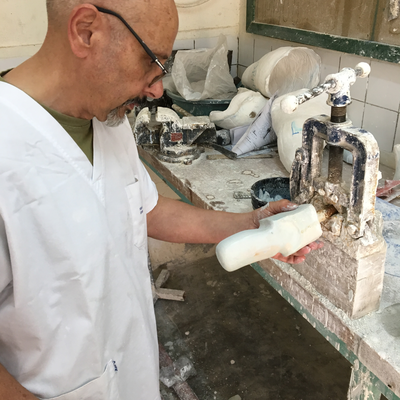 Roberto Postelmans processing a plaster cast.  HVP-Gatagara | Gatagara, Rwanda.  