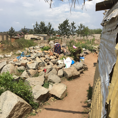 Mama Mzuka preparing food.  Lake Victoria Disability Centre | Musoma, Tanzania.
