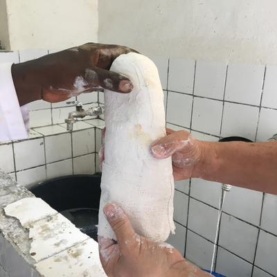 A plaster cast being post-processed by Roberto Postelmans.  HVP-Gatagara | Gatagara, Rwanda.  