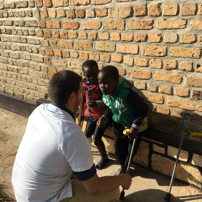Kyle Reeser with two lower-limb amputee in-patient's at HVP-Gatagara.  HVP-Gatagara | Gatagara, Rwanda.  