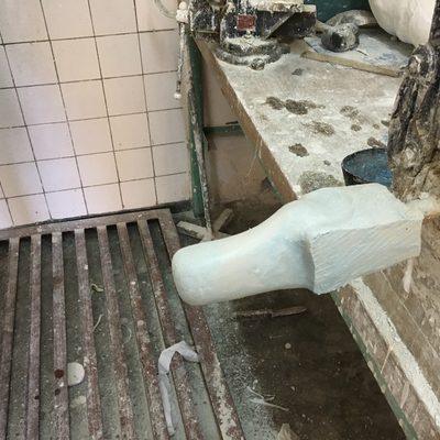 A plaster cast being post-processed by Roberto Postelmans.  HVP-Gatagara | Gatagara, Rwanda.  