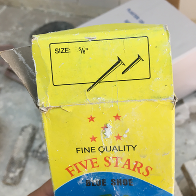 A box of tacks used for post-processing plaster casts of residual limbs.  HVP-Gatagara | Gatagara, Rwanda.  