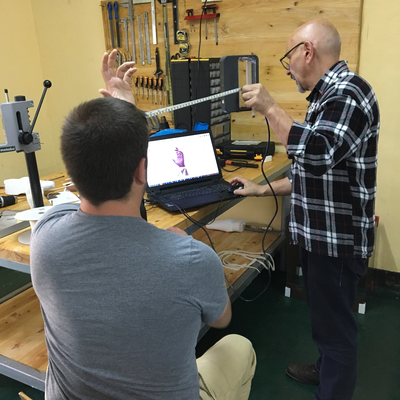 Roberto Postelmans demonstrating the difficulty of 3D scanning a hand.  ORTHOLAB | Gatagara, Rwanda.  