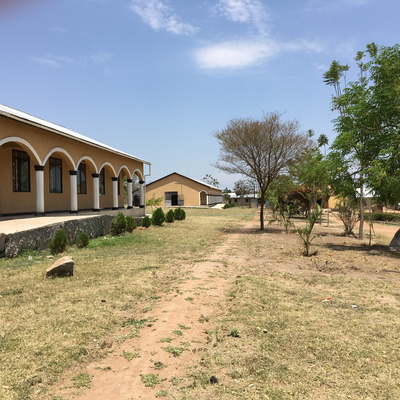 The Lake Victoria Disability Centre Campus consisted of many yellow buildings with corrugated metal roofs, all built and maintained by LVDC staff.  Lake Victoria Disability Centre | Musoma, Tanzania.