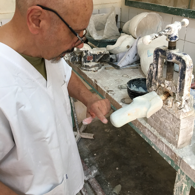 Roberto Postelmans processing a plaster cast.  HVP-Gatagara | Gatagara, Rwanda.  
