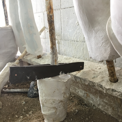 A plaster cast being processed by Roberto Postelmans.  HVP-Gatagara | Gatagara, Rwanda.  