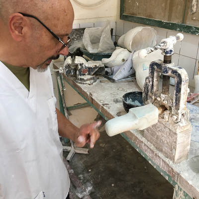 Roberto Postelmans processing a plaster cast.  HVP-Gatagara | Gatagara, Rwanda.  