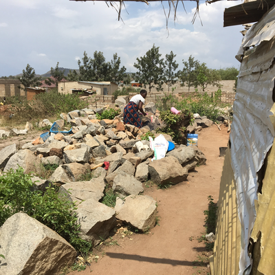 Mama Mzuka preparing food.  Lake Victoria Disability Centre | Musoma, Tanzania.