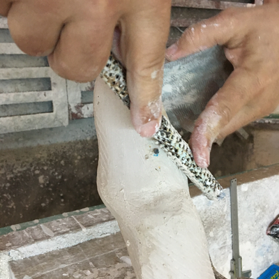 Roberto Postelmans processing a plaster cast.  HVP-Gatagara | Gatagara, Rwanda.  