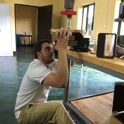 Kyle Reeser holding a soft socket in place for 3D scanning.  ORTHOLAB | Gatagara, Rwanda.  
