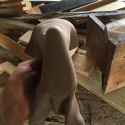 Cutting thermoformed foam insert to size for 3D printed foot abduction brace.  Lake Victoria Disability Centre | Musoma, Tanzania.  
