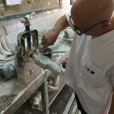 Roberto Postelmans processing a plaster cast.  HVP-Gatagara | Gatagara, Rwanda.  