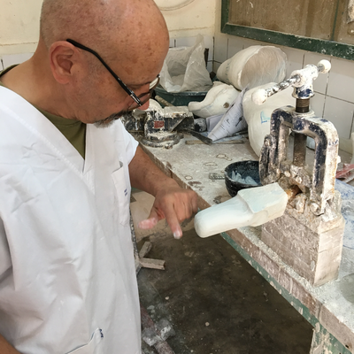 Roberto Postelmans processing a plaster cast.  HVP-Gatagara | Gatagara, Rwanda.  