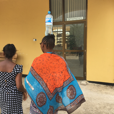 Technicians in the P&O department at LVDC, taking a break and showing off their balancing skills.  Lake Victoria Disability Centre | Musoma, Tanzania.