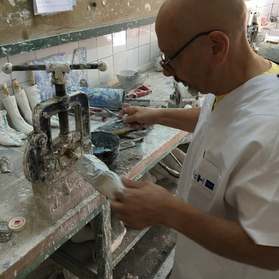 Roberto Postelmans processing a plaster cast.  HVP-Gatagara | Gatagara, Rwanda.  