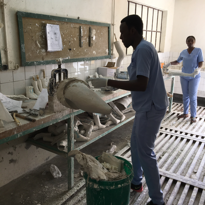 A technician in the P&O department at HVP-Gatagara processing a plaster cast.  HVP-Gatagara | Gatagara, Rwanda.  