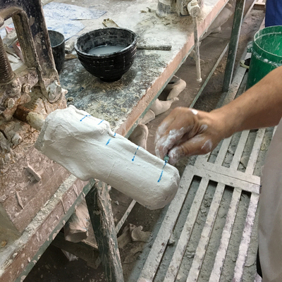 Roberto Postelmans processing a plaster cast.  HVP-Gatagara | Gatagara, Rwanda.  